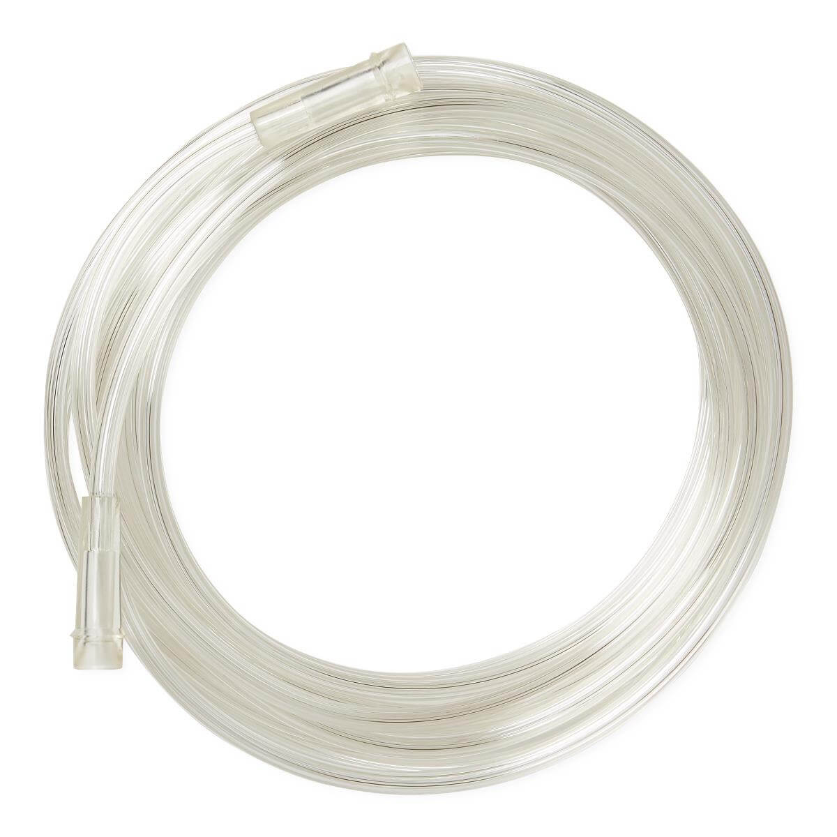 Oxygen tubing coiled in a circle with clear plastic connectors on each end, shown on white background