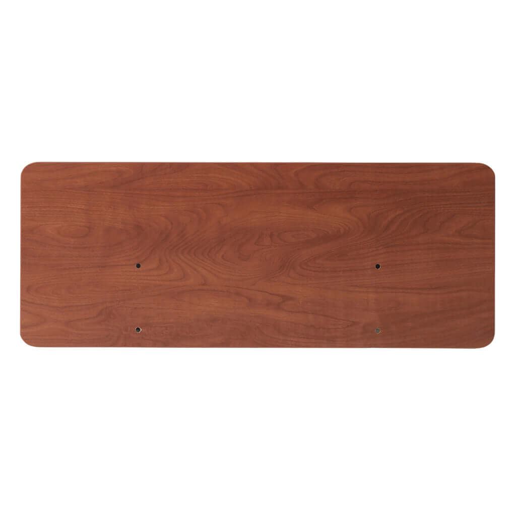 Overhead view of a full electric hi-low bed's rectangular wood-grain top panel with rounded corners and four mounting holes