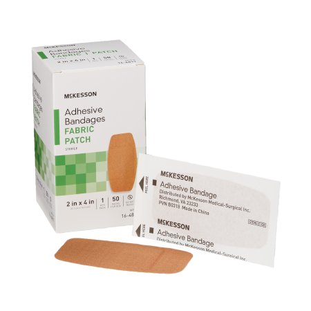 Adhesive bandage fabric patch box of 50 by McKesson with two individually wrapped tan rectangular strips shown outside the