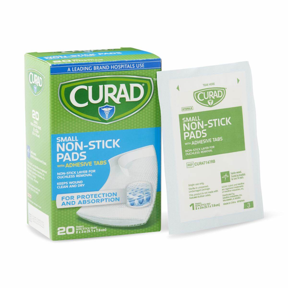 Non-stick wound pads box of 20 with adhesive tabs beside a single sterile individually wrapped pad packet, white background
