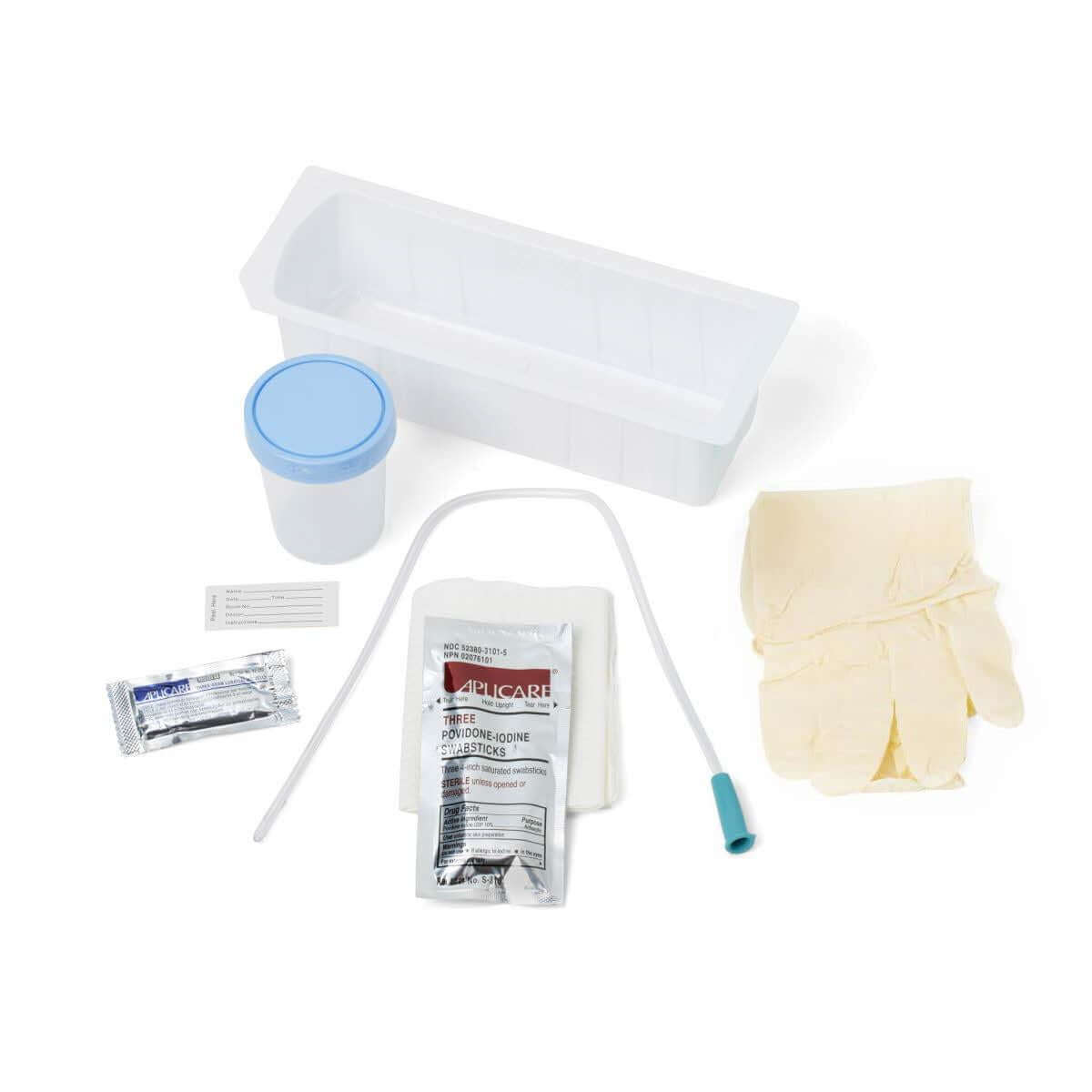 Urethral catheterization tray kit with vinyl catheter, solution cup, latex gloves, povidone-iodine swabsticks, and drape