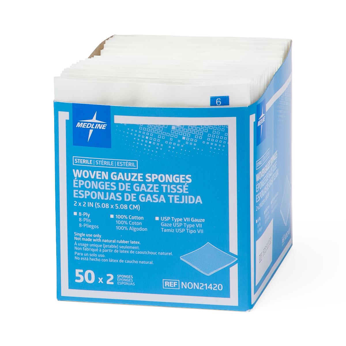Sterile woven gauze sponges in open blue box with individually wrapped white packets visible at top