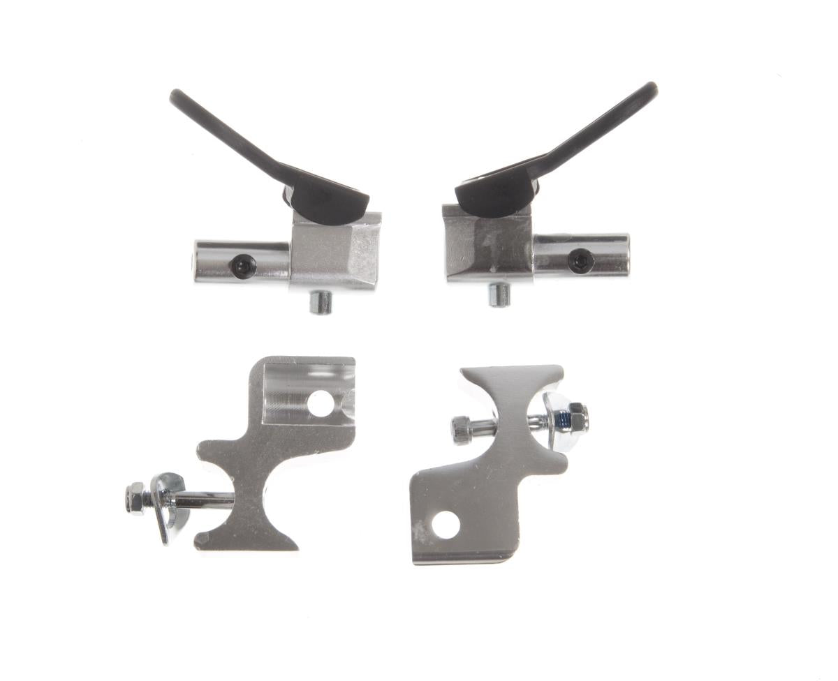 Wheelchair arm assembly hardware set showing two metal clamp brackets with black lever handles and two mounting brackets