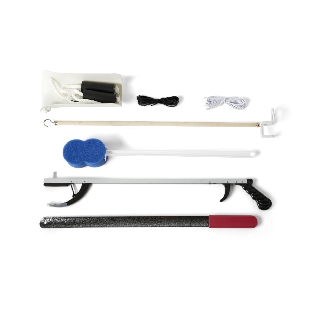 Hip replacement kit laid flat showing reacher, long-handled sponge, shoehorn, dressing stick, sock aid, and elastic laces