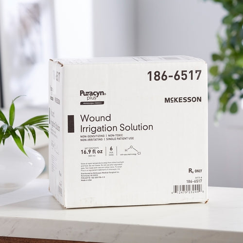 McKesson Puracyn Plus wound irrigation solution box showing item number 186-6517, 16.9 fl oz, 6 per case, on white surface