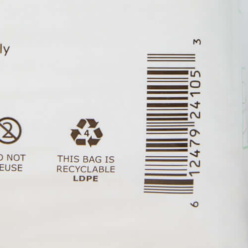 Absorbent underwear packaging back panel showing do not reuse symbol, recyclable LDPE label, and barcode