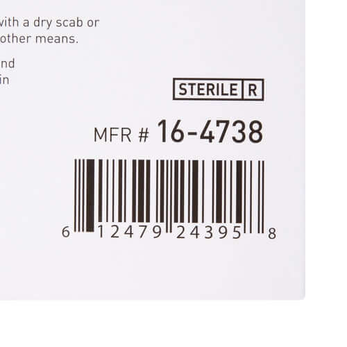 Foam dressing packaging label showing sterile designation, manufacturer number 16-4738, and barcode