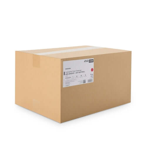 Foam dressing bulk case, large corrugated cardboard box with product label on white background