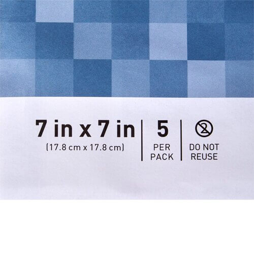 IV site barrier protector packaging showing blue checkered design, labeled 7 in x 7 in, 5 per pack, do not reuse