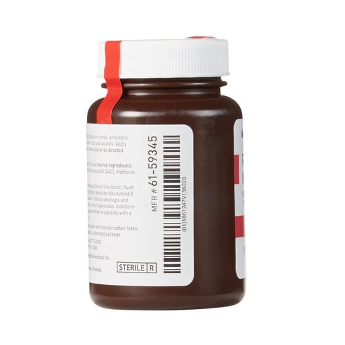 McKesson iodoform wound packing strip in amber bottle with white cap, barcode label, and sterile marking visible on side