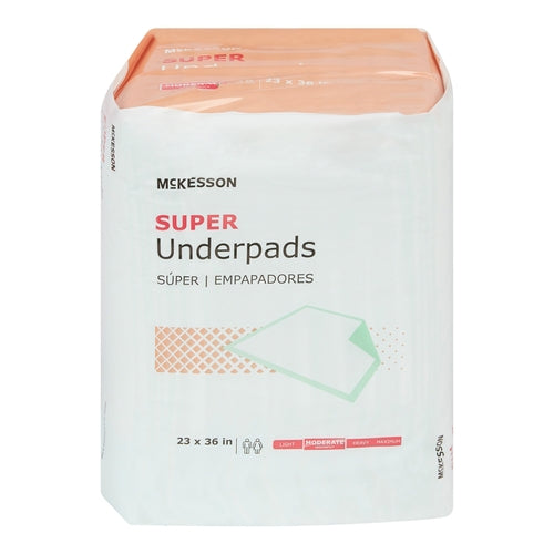 McKesson Super Underpads package, white and peach packaging showing 23 x 36 inch size with moderate absorbency rating