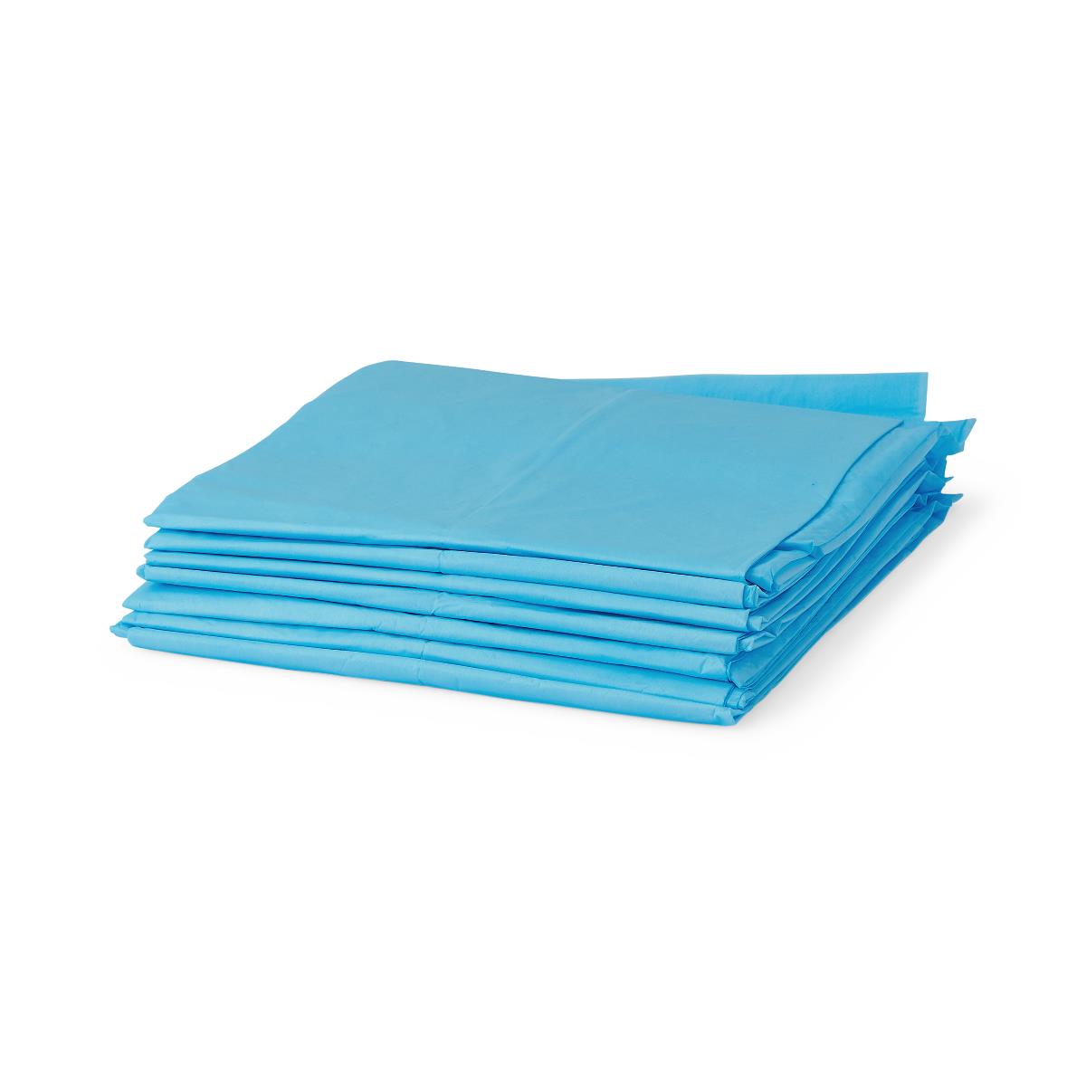 Disposable underpads stacked in a neat pile, light blue, folded flat on a white background