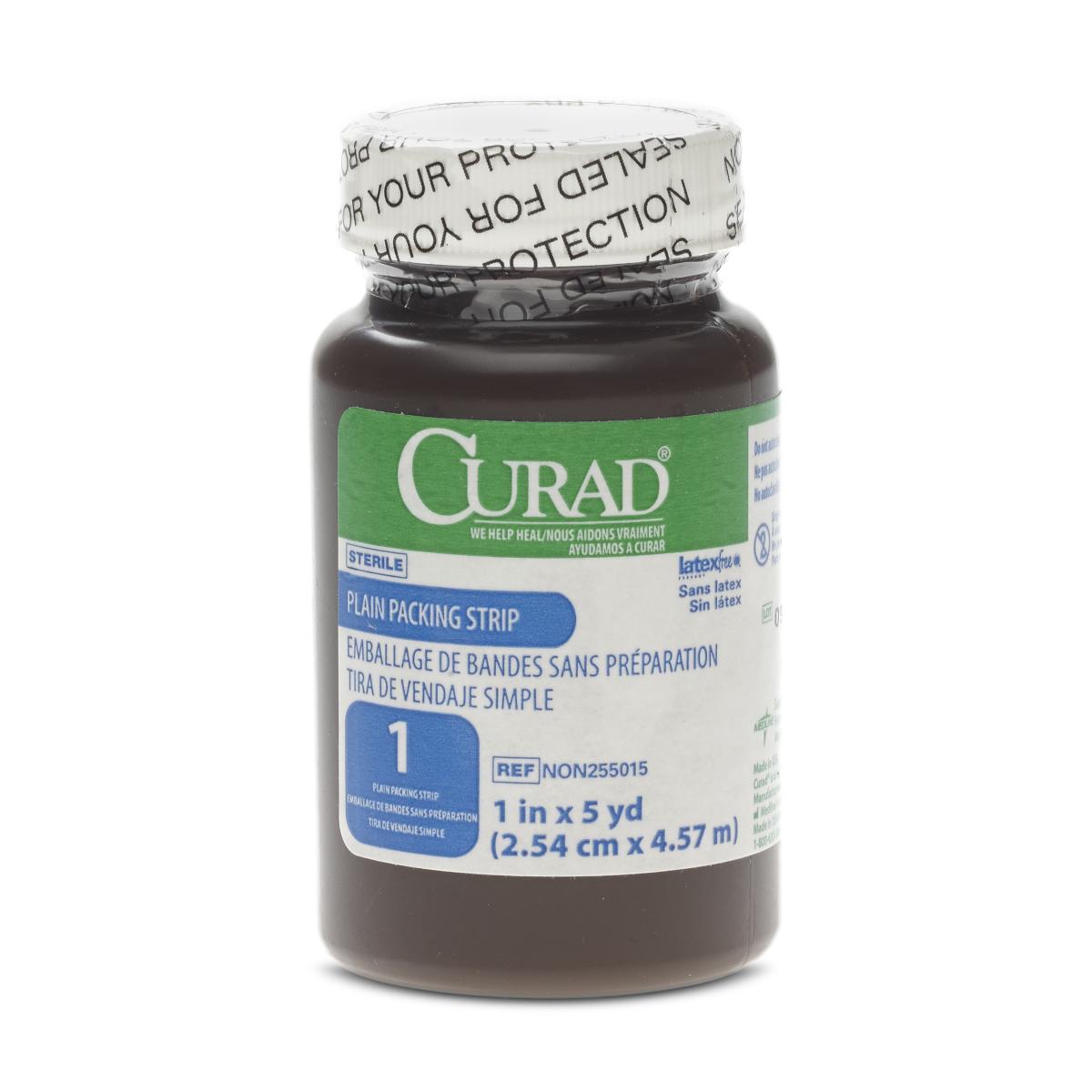 Sterile plain gauze packing strip in a sealed dark brown jar with green and white Curad label, 1 in x 5 yd