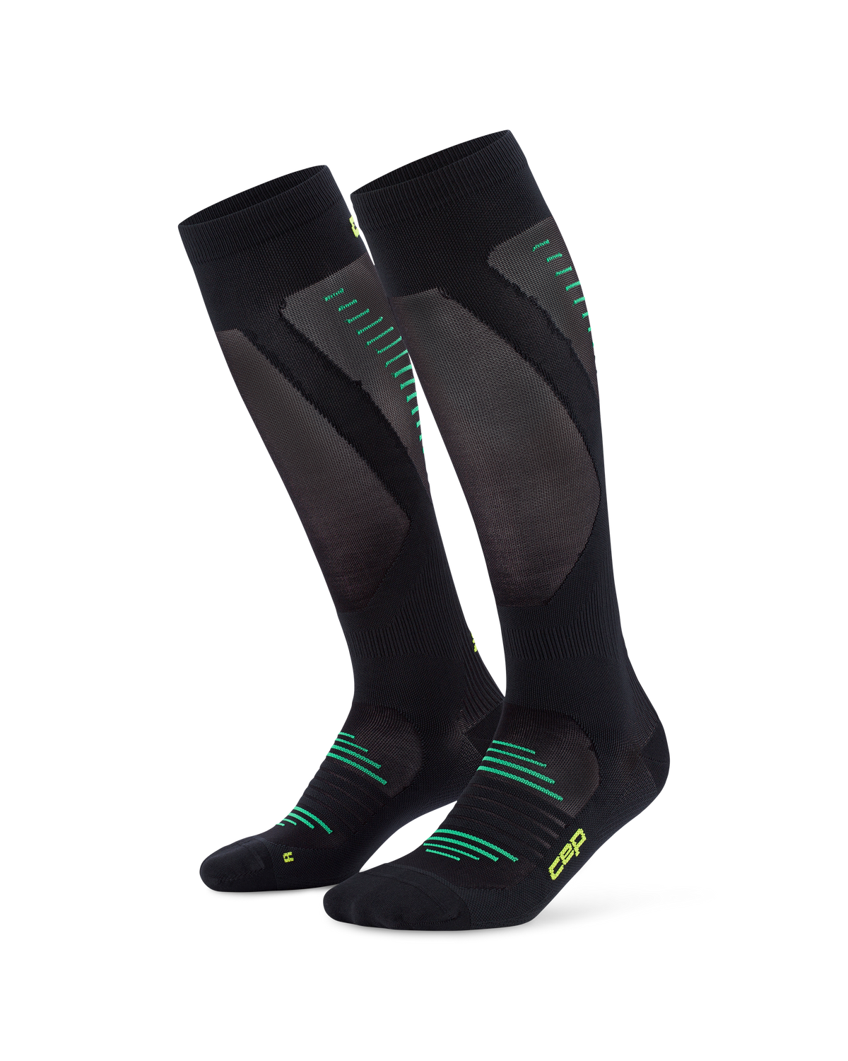 Compression knee-high socks in black with gray panels and green accent stripes, shown as a pair on white background