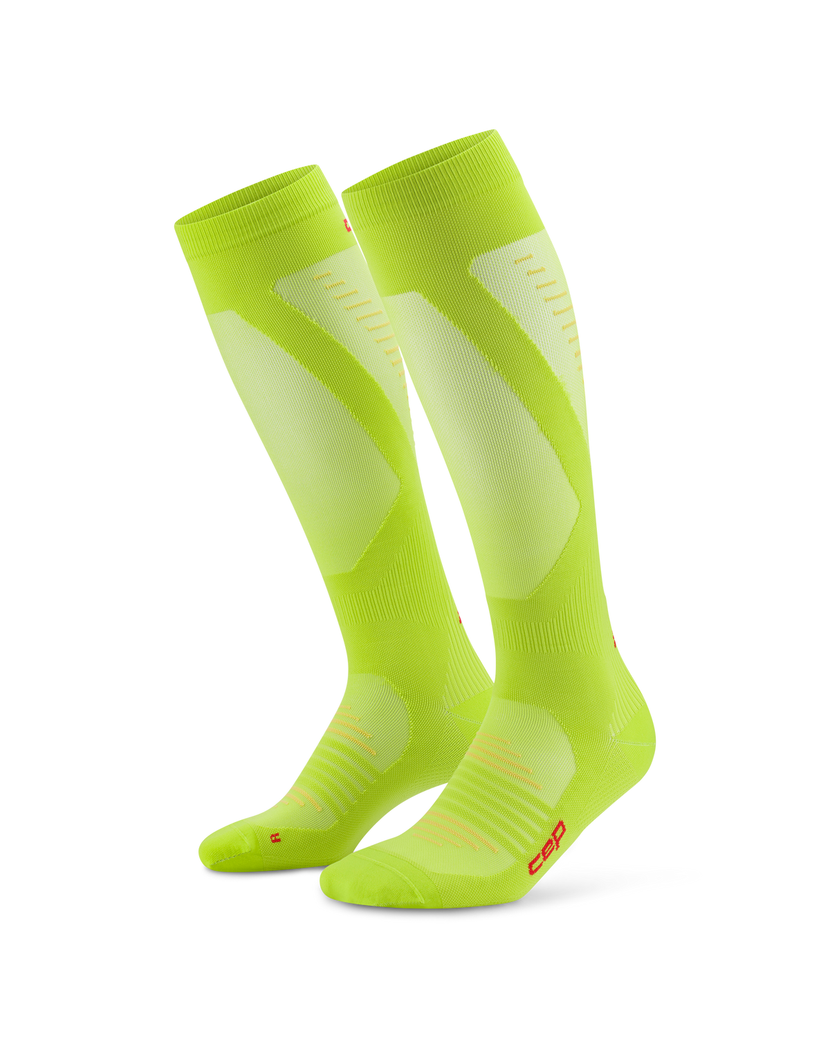 Compression knee-high socks in neon yellow-green with light panel accents and red logo detailing, shown as a pair