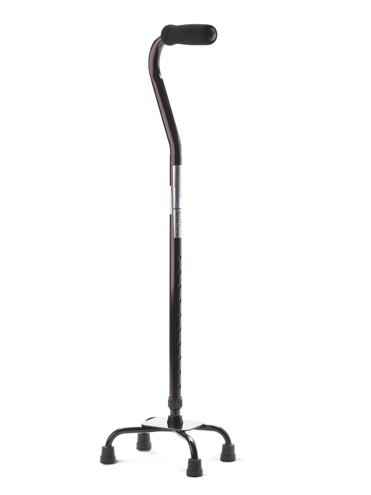 Quad cane with small four-legged base, adjustable black shaft, and cushioned offset handle, shown upright on white background