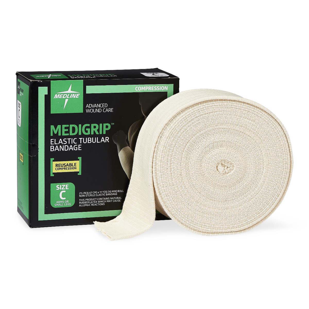 Elastic tubular bandage roll in natural beige beside its black and green box, Size C for arms or small legs