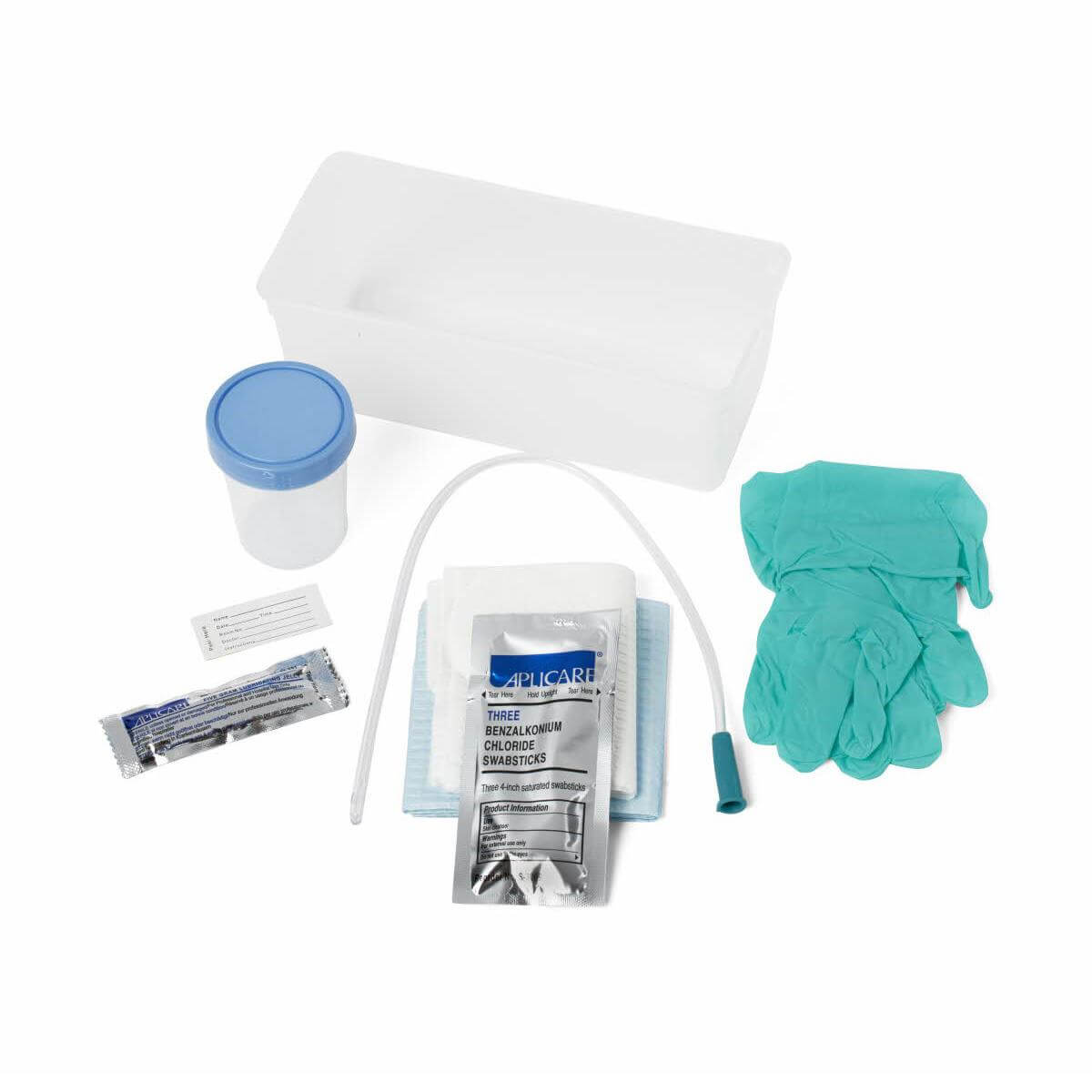 Urethral catheterization tray kit with vinyl catheter, specimen cup, gloves, swabsticks, drape, and plastic basin on white