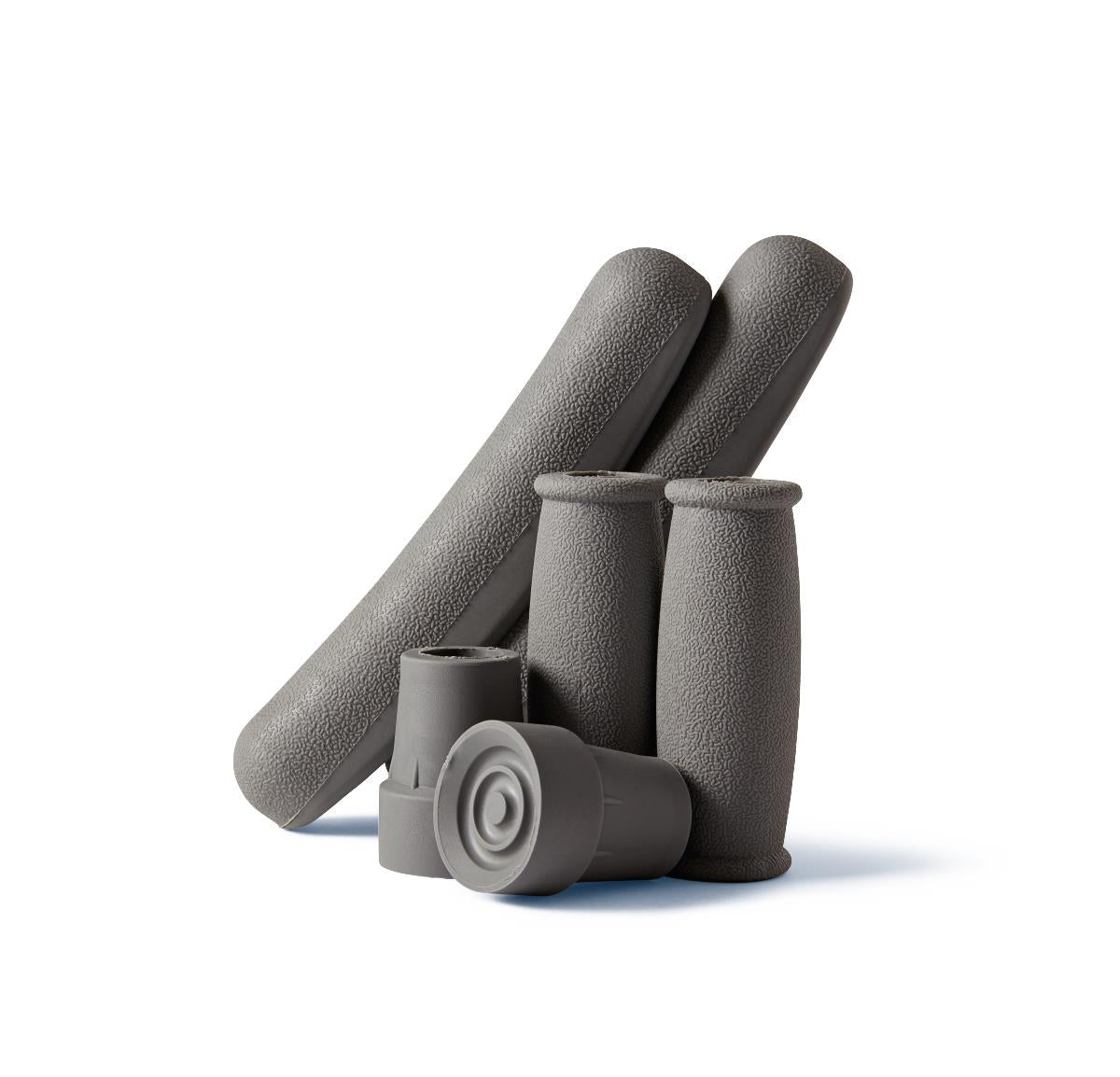 Crutch accessory kit with gray textured handgrips, underarm pads, and rubber tips grouped together on white background