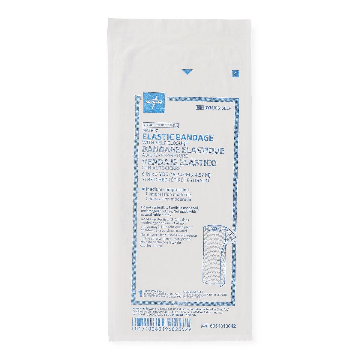 Elastic bandage with self-closure in sealed sterile packaging, shown against a white background