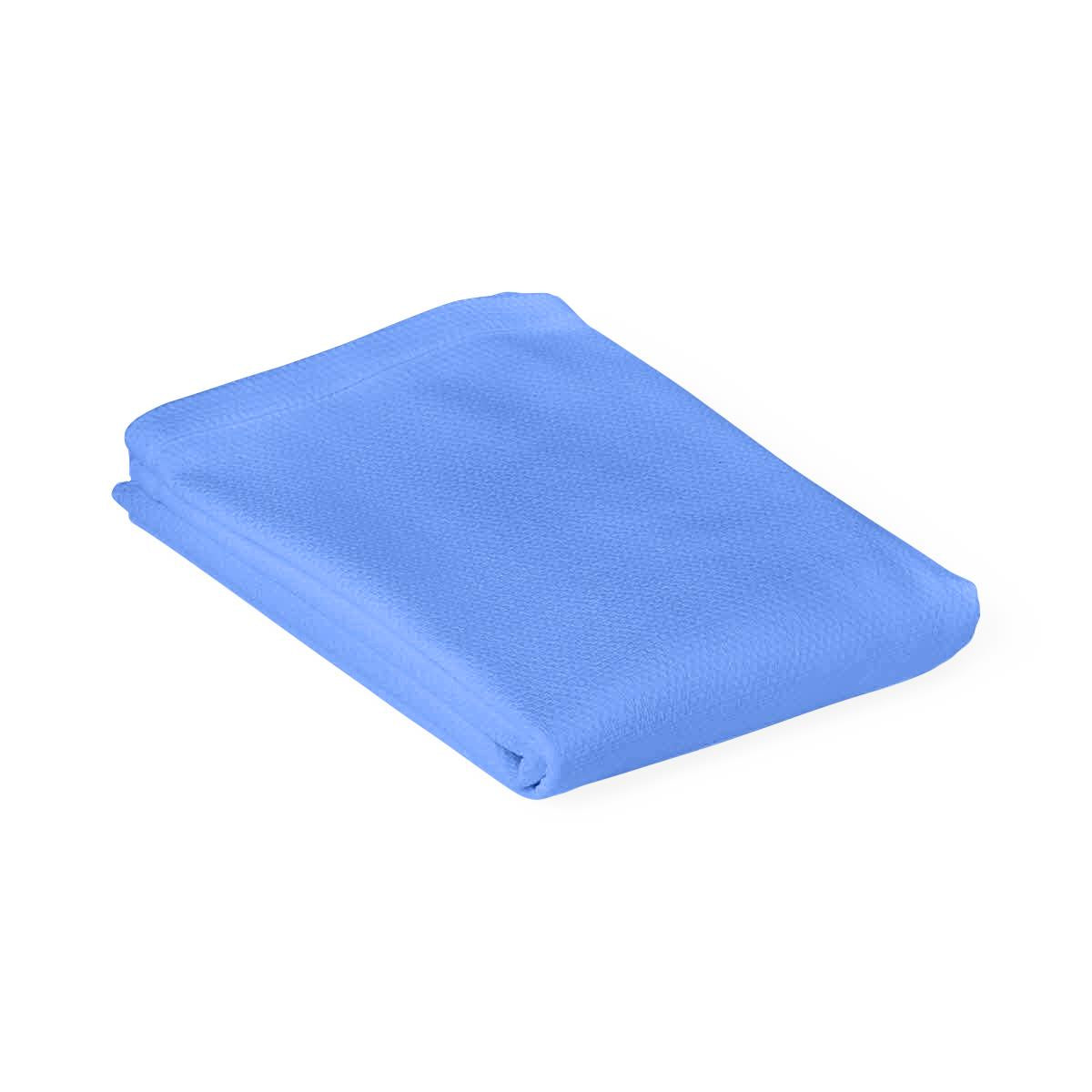Folded blue reusable OR towel with textured terry fabric, shown flat against white background