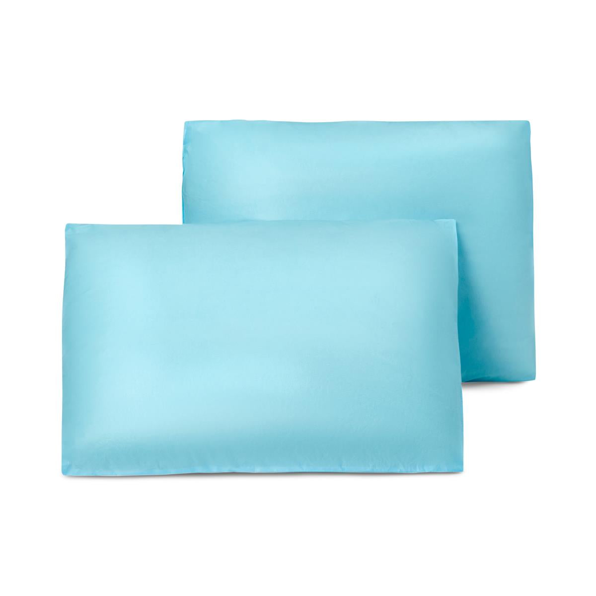 Pair of rectangular bed pillows in light blue fabric covers on a white background