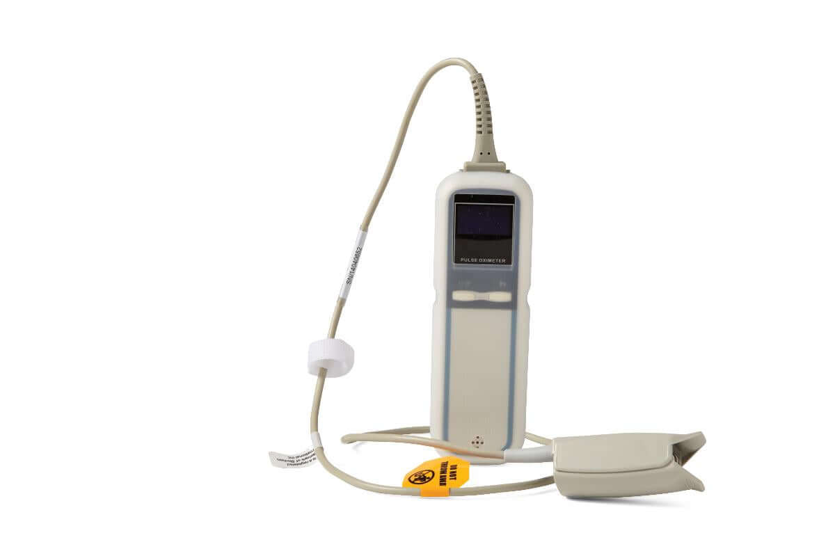 Handheld pulse oximeter with small display screen, two buttons, and attached finger clip sensor with cable on white