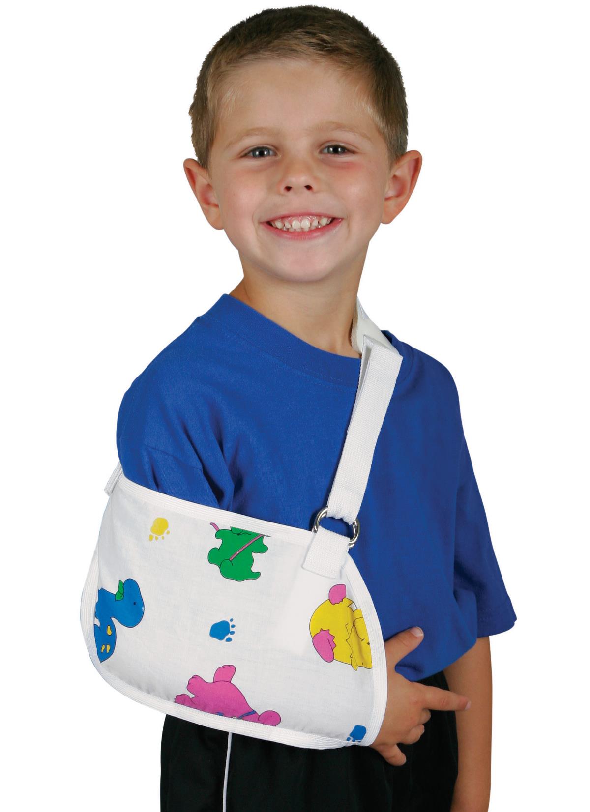 Child's arm sling with colorful animal print worn by a smiling young boy in a blue shirt