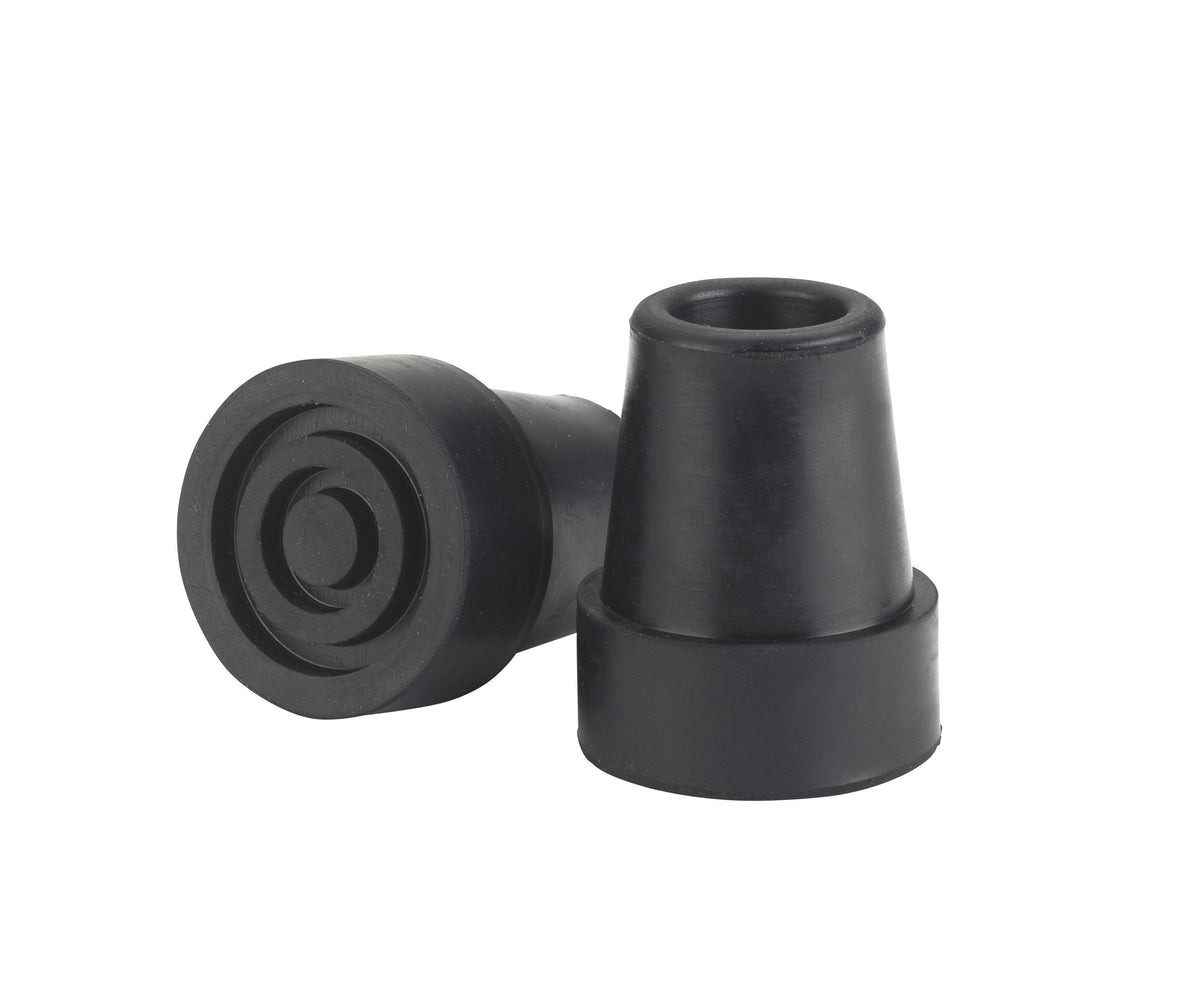 Pair of black rubber cane tips with tapered body and ribbed base, one standing upright and one on its side showing the