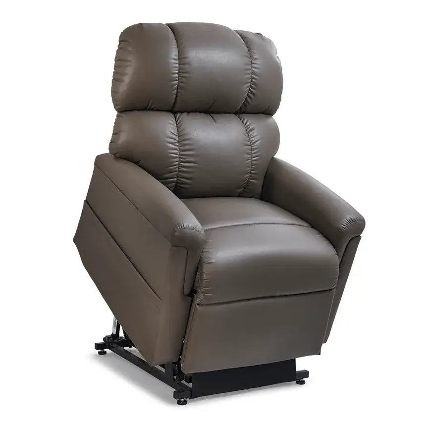 Power lift recliner chair in gray leather-like upholstery with tufted pillow-back design, shown in upright seated position