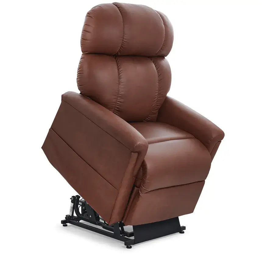 Power lift recliner chair in brown faux leather with tufted pillow-back design, shown in upright seated position with lift
