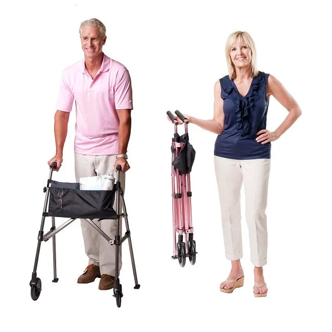 Folding walker shown in use by a man and folded compact beside a woman, featuring front wheels and a storage bag