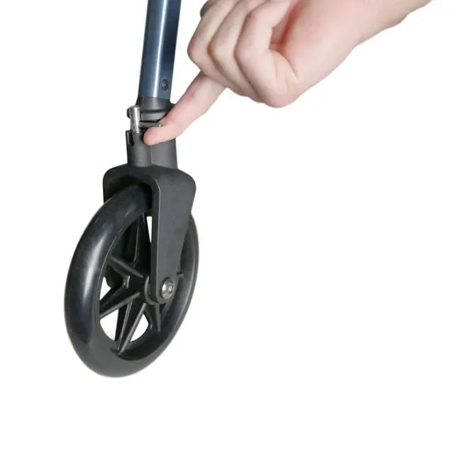 Rollator walker front wheel and folding release button being pressed by a hand, showing the EZ fold mechanism on a blue frame