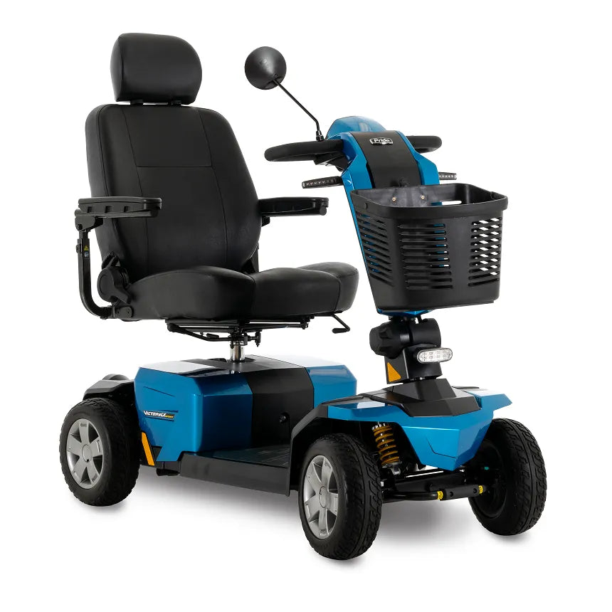 Power mobility scooter in blue with black captain's seat, rear-view mirror, front basket, suspension, and four wheels