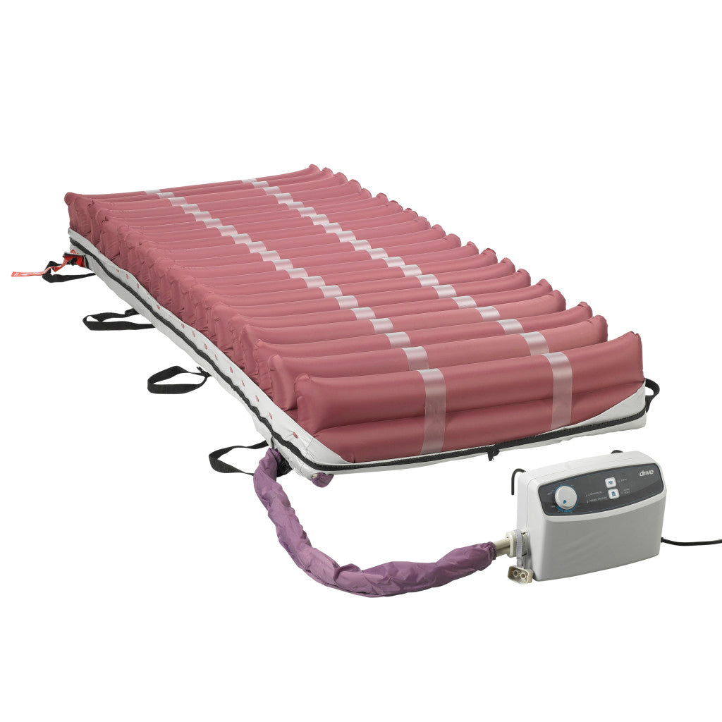 Alternating pressure mattress system with pink tubular air cells, side straps, and electric pump unit connected by purple