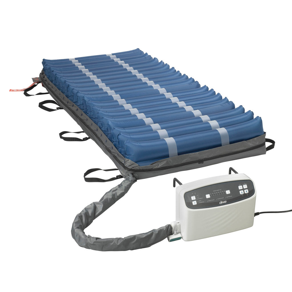 Alternating pressure mattress system with blue air cells, side straps, and connected electric pump unit on white background