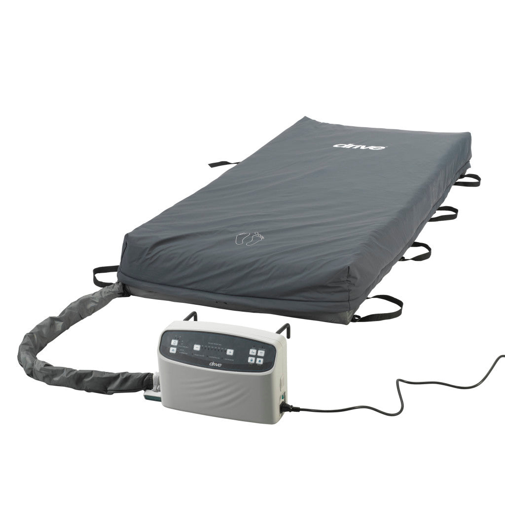 Alternating pressure mattress system with gray cover, side straps, and connected electric pump control unit on white