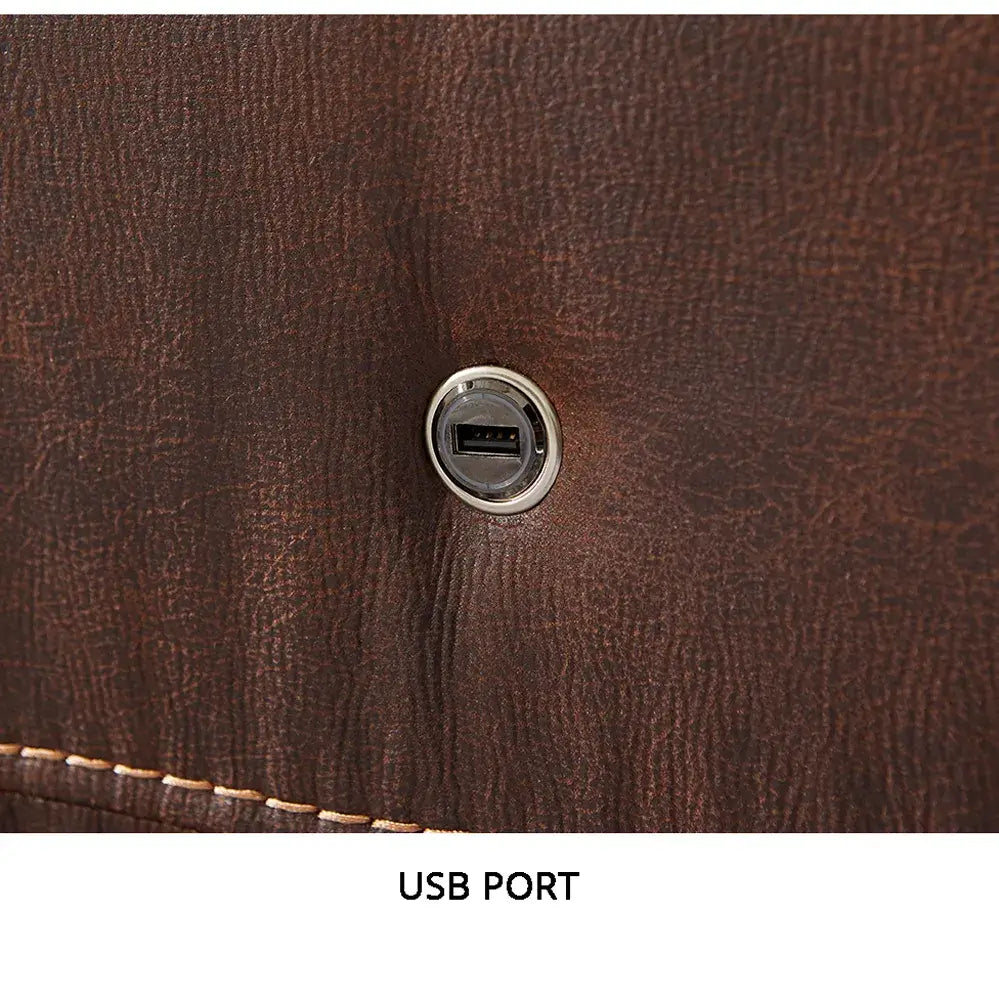Lift chair USB charging port set into brown faux leather upholstery with silver trim ring