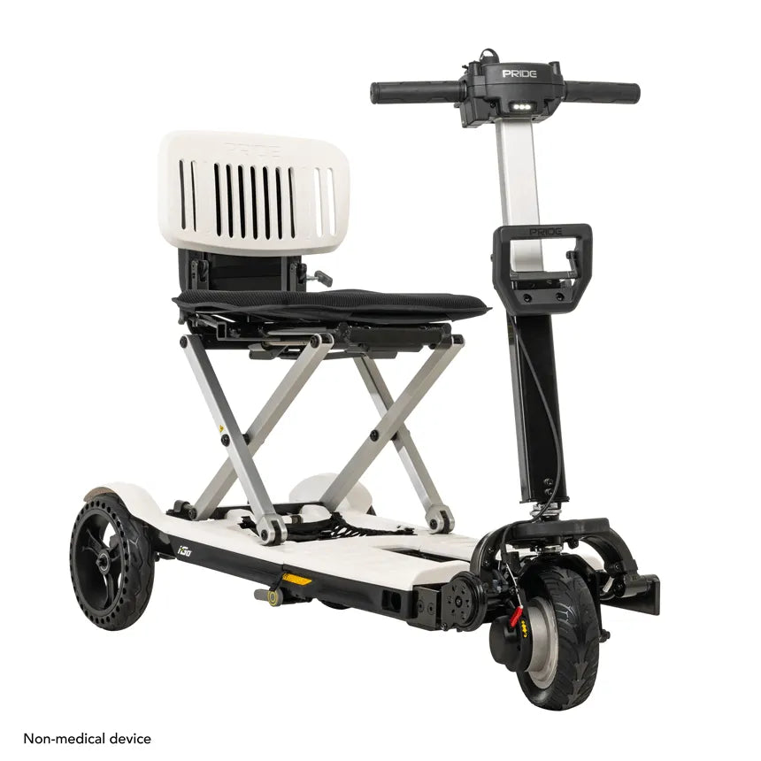 Folding mobility scooter with white frame, black seat, scissor-fold chassis, four wheels, and handlebar tiller with