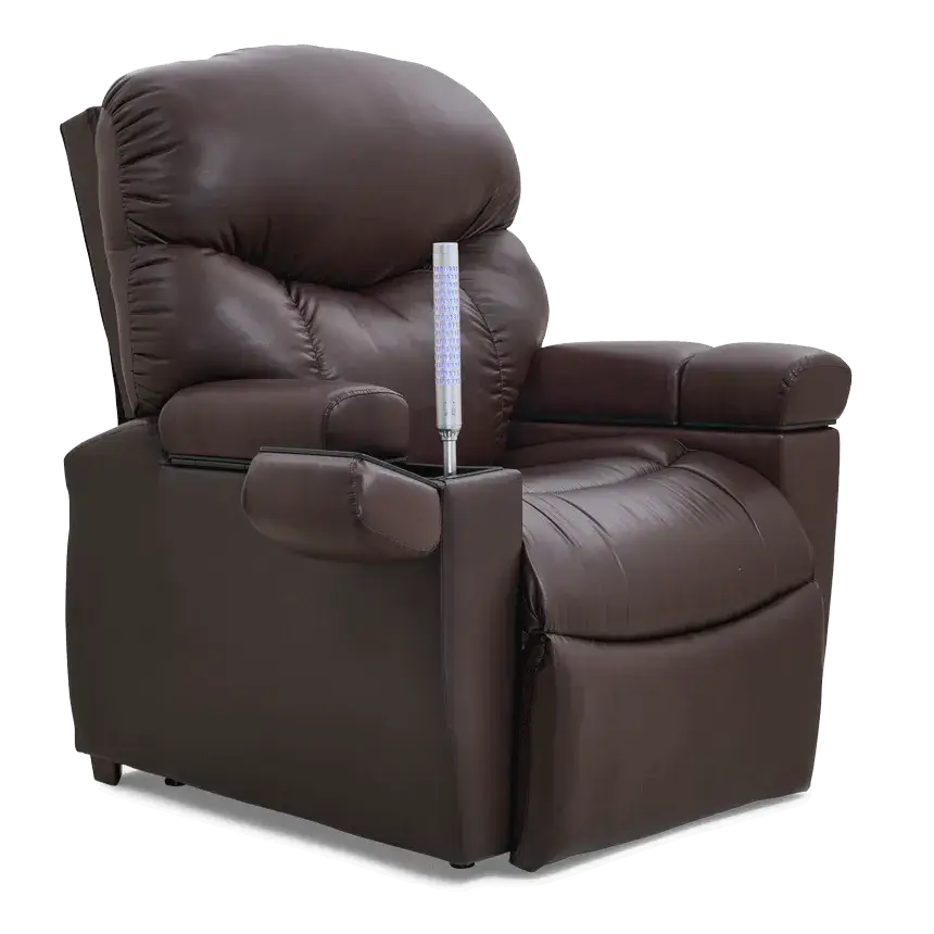 Power lift recliner in dark brown faux leather with tufted back, padded armrests, and a hand control between the armrest and