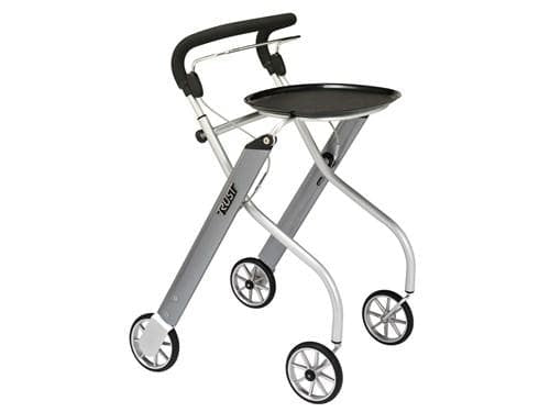 Indoor rollator with narrow silver frame, padded curved handles, four wheels, and attached black serving tray