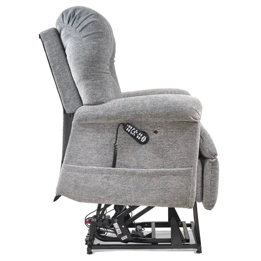 Power lift recliner chair in gray fabric shown from the side in upright position with wired remote and visible lift