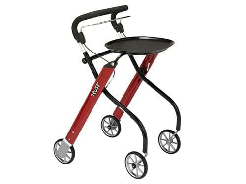 Indoor rollator with narrow red and black folding frame, four wheels, curved handles, and attached tray
