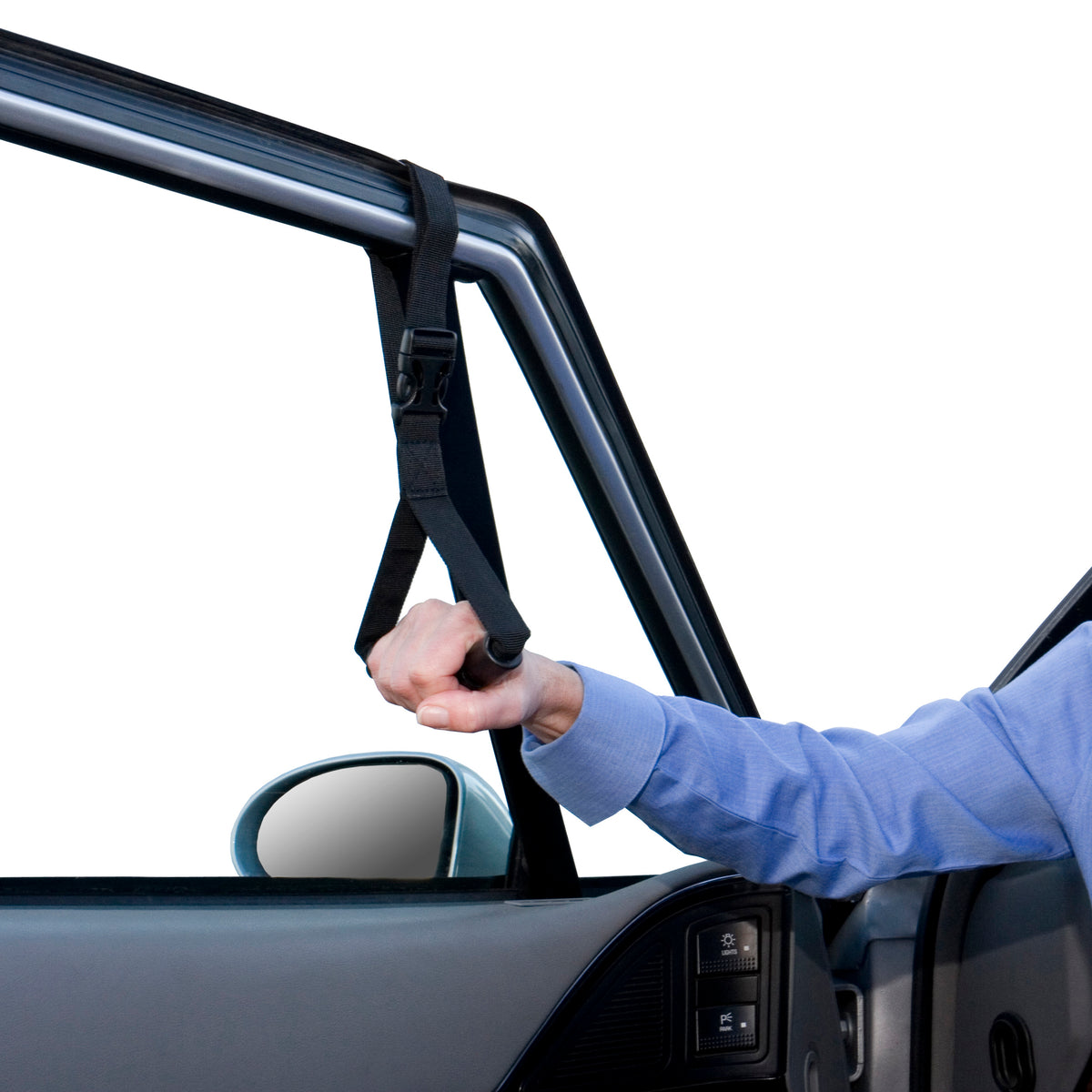 Car caddie portable handle with black strap looped around vehicle door frame, shown being gripped by a person's hand while