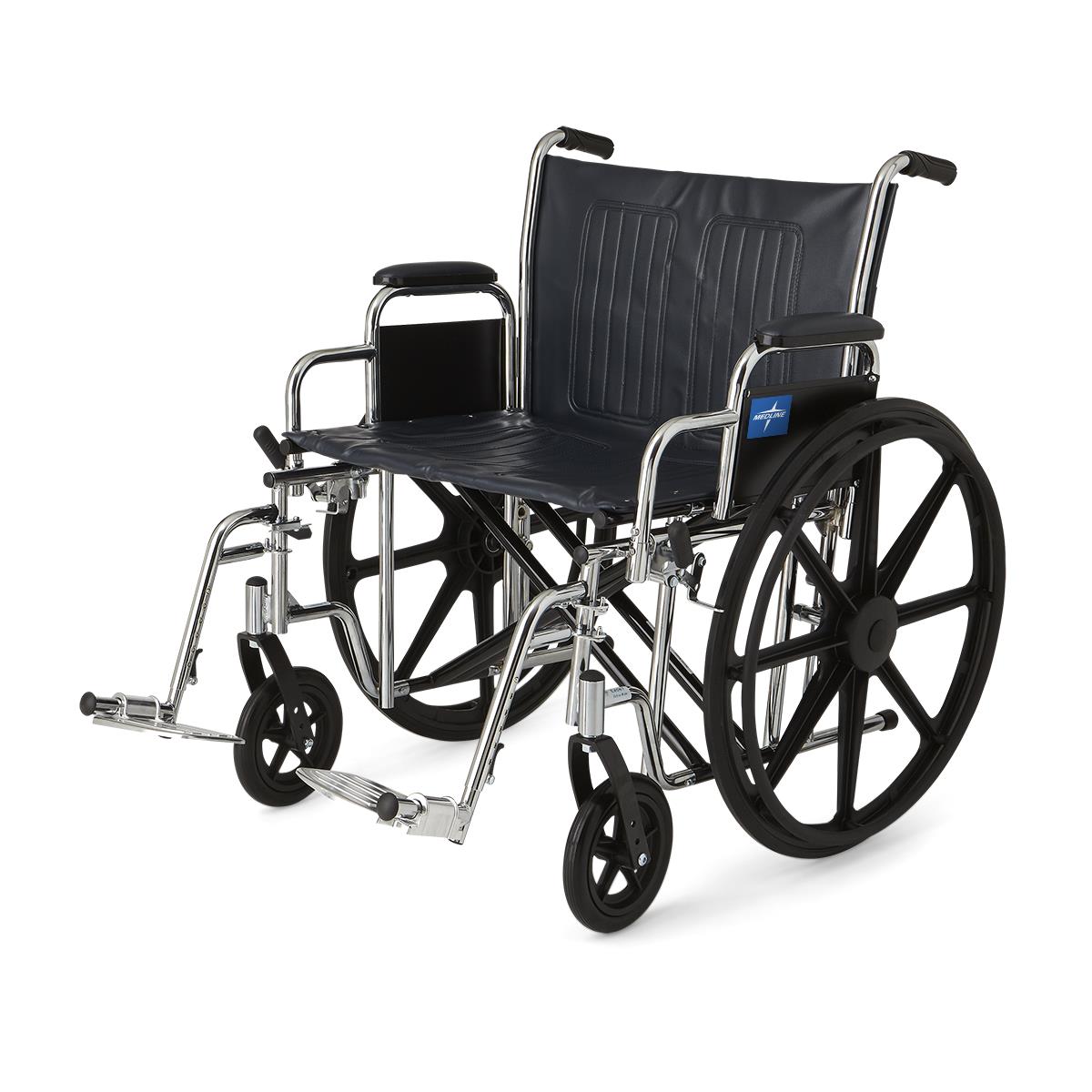 Wheelchair with navy vinyl upholstery, chrome frame, removable desk-length arms, detachable footrests, and large black rear