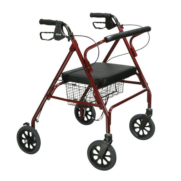 Rollator walker with red frame, padded seat, hand brakes, wire basket, and four large black wheels on white background