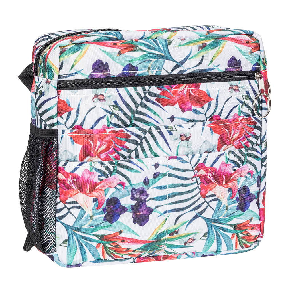 Walker tote bag with tropical floral print, zip pockets, and black mesh side pocket on white background
