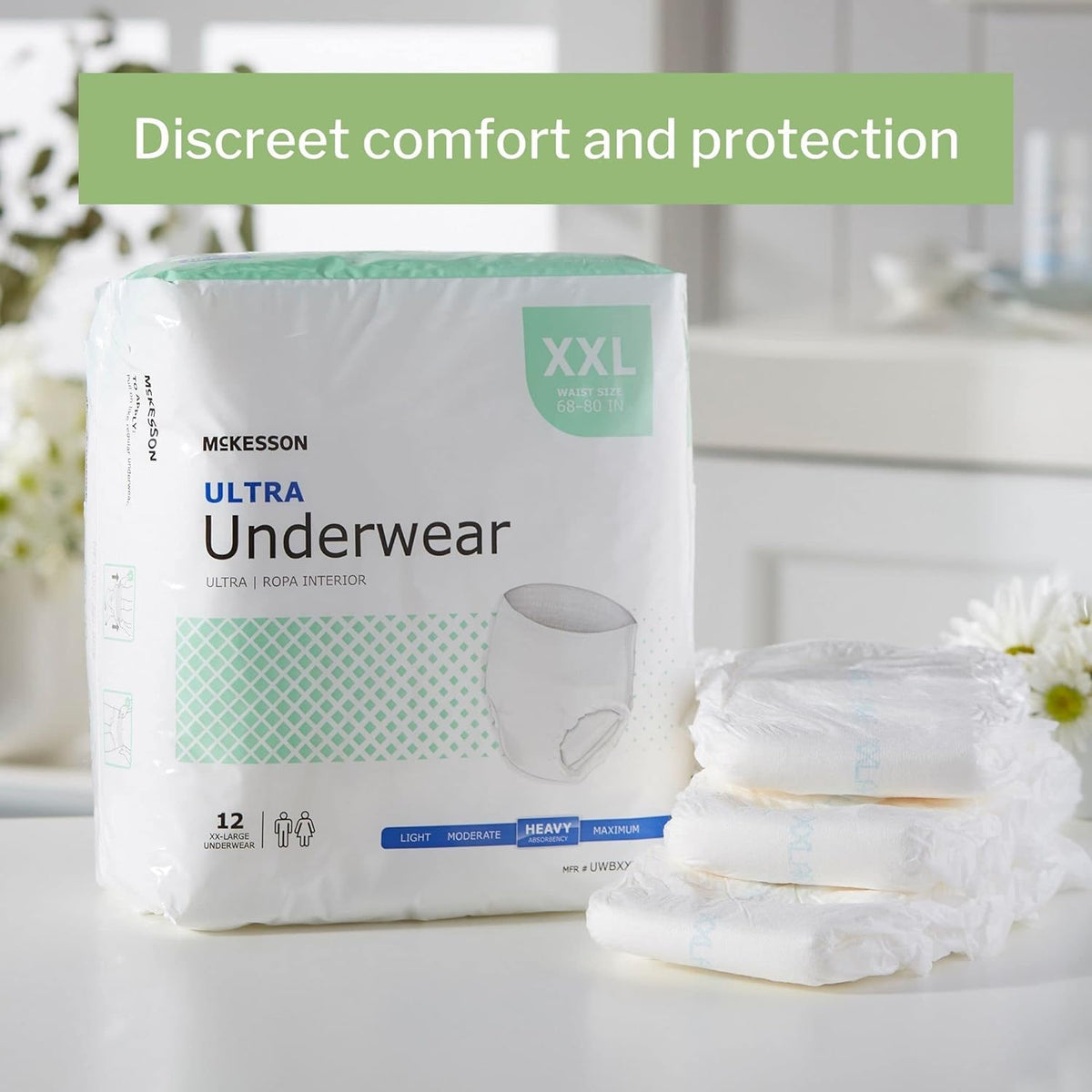 McKesson Ultra Pull On absorbent underwear XXL package of 12 beside a folded stack, on a white bathroom counter