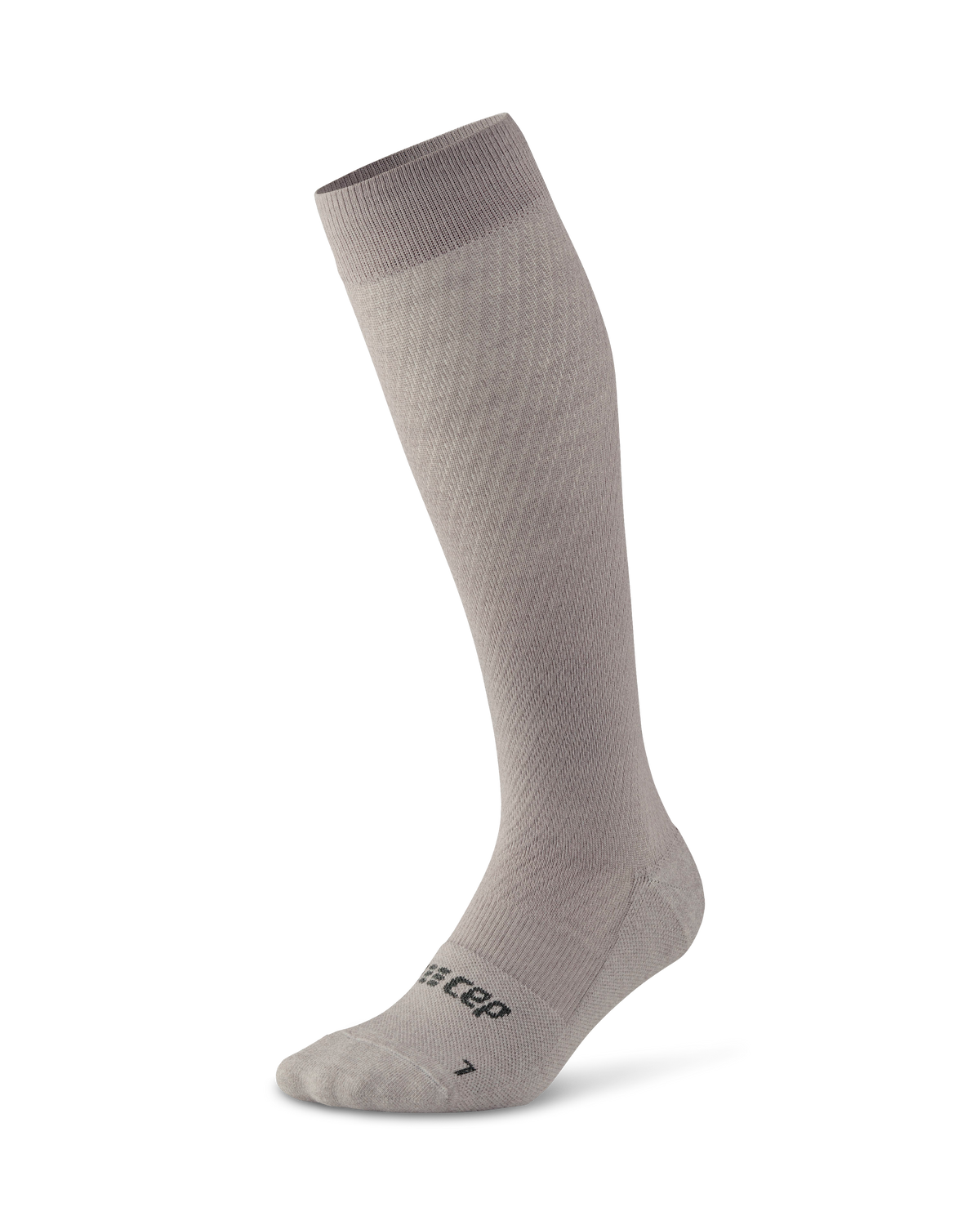 Compression knee-high sock in light gray with ribbed cuff and reinforced toe, shown as a single sock on white background