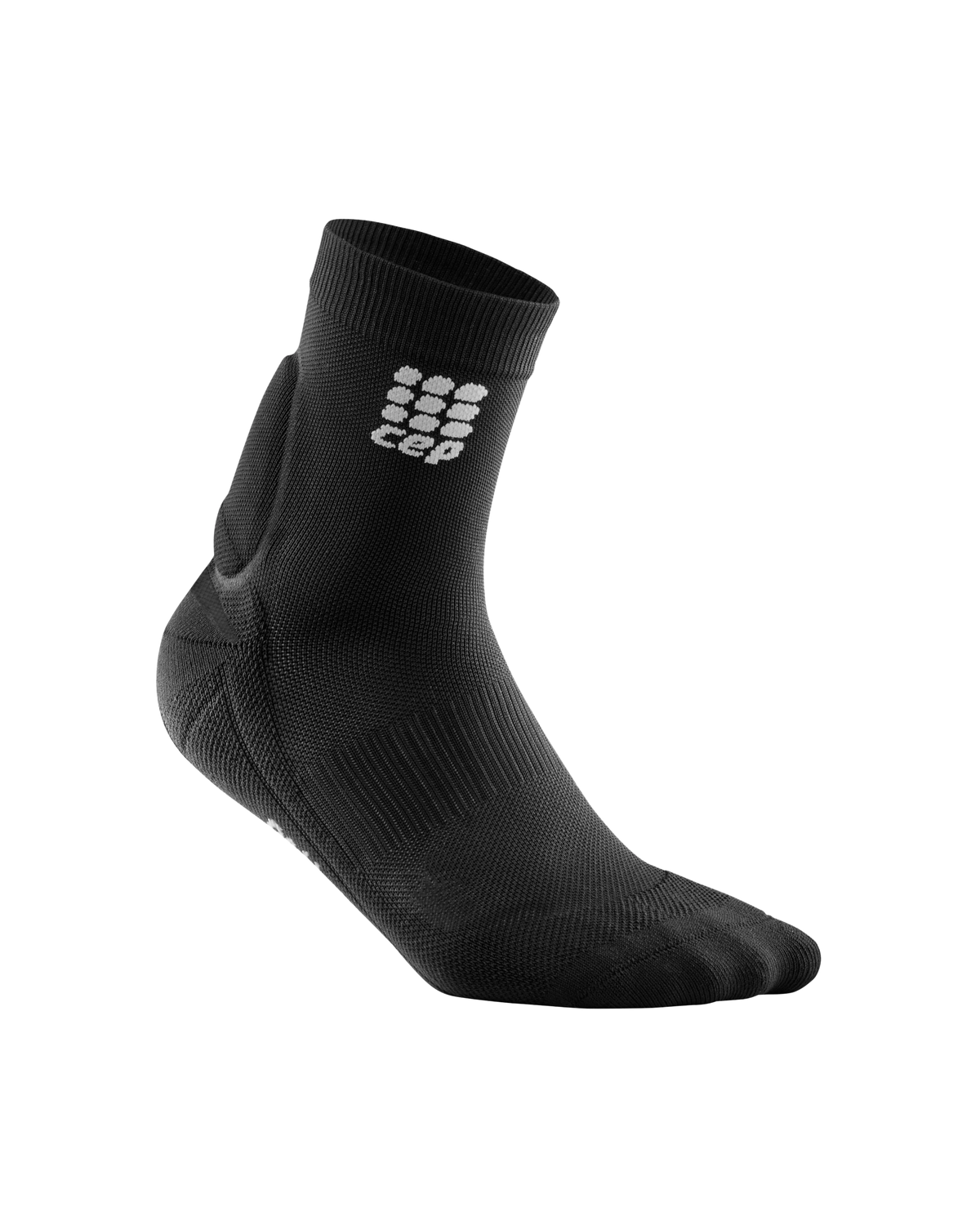 Achilles support compression sock in black with ankle stabilizer pad and gray logo, ankle-height cut, shown solo on white